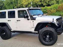 Biały Używany 2014 Jeep Wrangler Sahara SUV | 115 000 zł (Drogi)