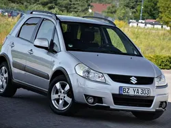 Srebrny (metalik, perła) Używany 2009 Suzuki SX4 SUV | 18 900 zł (Dobra cena)