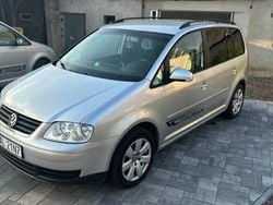 Srebrny Używany 2006 VW Touran Minivan | 14 300 zł (Uczciwa cena)