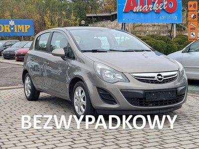 Używany Opel Corsa 101 KM (74 kW) 2014 Beżowy (metalik) Hatchback