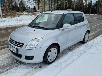 Srebrny Używany 2010 Suzuki Swift Hatchback | 11 400 zł (Dobra cena)