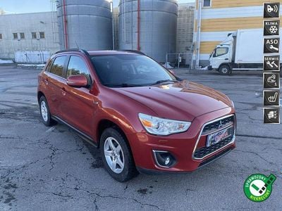Używany Mitsubishi ASX 116 KM (85 kW) 2014 Bordowy SUV