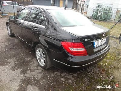 Używany Mercedes C180 156 KM (114 kW) 2011 Czarny Sedan/Limuzyna