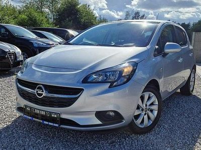 Używany Opel Corsa 75 KM (55 kW) 2016 Srebrny (metalik) Hatchback