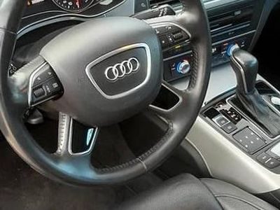Używany Audi A6 218 KM (160 kW) 2015 Czarny Kombi