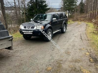 Używany Nissan Navara 133 KM (97 kW) 2011 Czarny Pickup