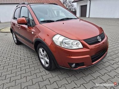 Pomarańczowy Używany 2009 Suzuki SX4 Hatchback | 14 900 zł (Dobra cena)