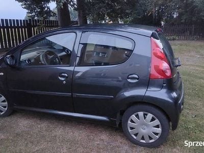 Używany Peugeot 107 68 KM (50 kW) 2008 Szary Hatchback