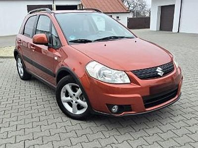 Pomarańczowy Używany 2009 Suzuki SX4 Hatchback | 14 900 zł (Dobra cena)