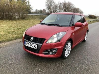 Czerwony Używany 2012 Suzuki Swift Sport Hatchback | 27 300 zł (Uczciwa cena)