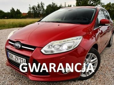 Używany Ford Focus 125 KM (91 kW) 2013 Bordowy (metalik, perła) Kombi