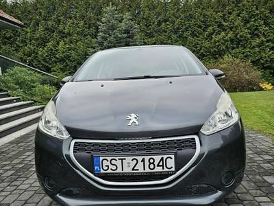 Używany Peugeot 208 68 KM (50 kW) 2014 Grafitowy Hatchback