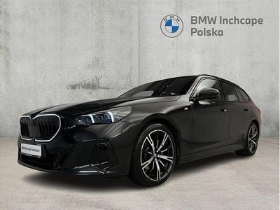 Używany BMW 520 Comfort Edition 197 KM (144 kW) 2024 Black sapphire metallic metalizowany Kombi