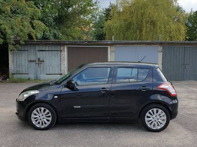 Używany Suzuki Swift 94 KM (69 kW) 2011 Czarny Hatchback