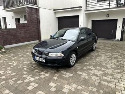 Używany Mitsubishi Carisma Elegance 125 KM (91 kW) 2000 Czarny Hatchback