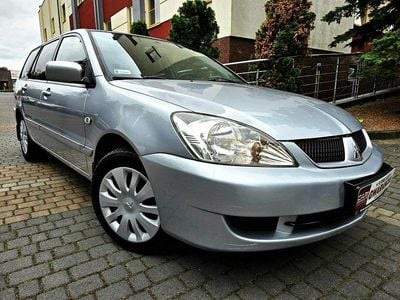 Srebrny (metalik) Używany 2006 Mitsubishi Lancer Kombi | 8999 zł