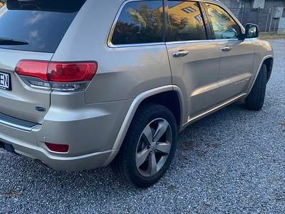 Złoty Używany 2013 Jeep Grand Cherokee Overland SUV | 57 000 zł (Dość drogi)