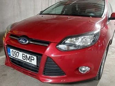 Używany Ford Focus 105 KM (77 kW) 2014 Czerwony Kombi