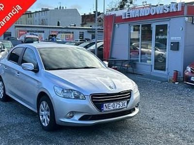 Używany Peugeot 301 72 KM (52 kW) 2014 Srebrny Sedan/Limuzyna