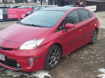 Używany Toyota Prius 100 KM (73 kW) 2014 Czerwony Hatchback