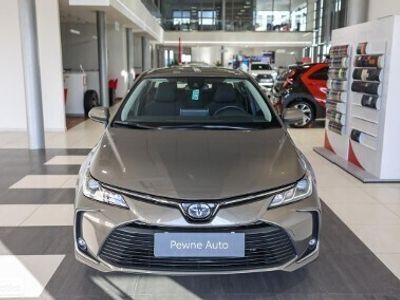 Używany Toyota Corolla Comfort 122 KM (89 kW) 2022 Brązowy Sedan/Limuzyna