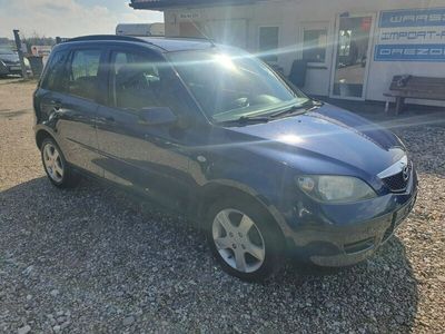 używany Mazda 2 1.4dm 80KM 2004r. 156 011km