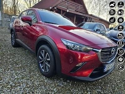 Używany Mazda CX-3 122 KM (89 kW) 2021 Bordowy SUV