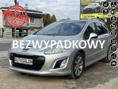 Używany Peugeot 308 SW 112 KM (82 kW) 2013 Srebrny Kombi