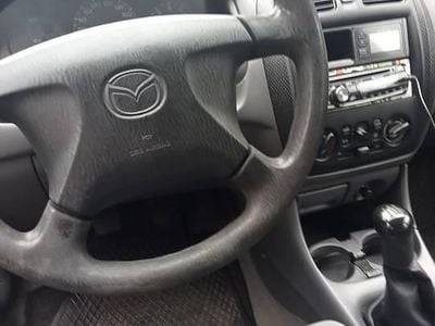 Srebrny Używany 1999 Mazda 323 Hatchback | 2500 zł