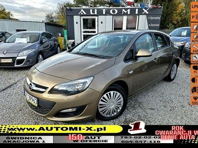 Złoty Używany 2013 Opel Astra Hatchback | 26 800 zł (Uczciwa cena)