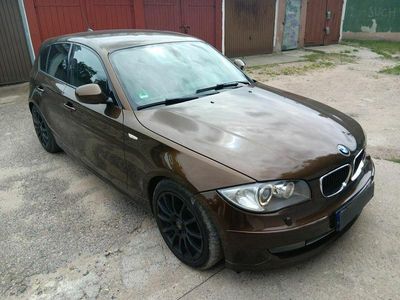 Brązowobeżowy Używany 2010 BMW 123 Hatchback | 26 900 zł