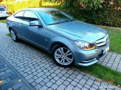 Używany Mercedes C180 156 KM (114 kW) 2011 Szary Coupe