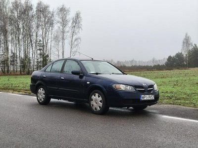Używany Nissan Almera 98 KM (72 kW) 2006 Czarny Sedan/Limuzyna
