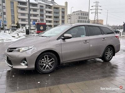 Używany Toyota Auris Hybrid 2014 Beżowy Kombi