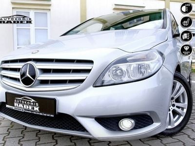 Używany Mercedes B180 122 KM (89 kW) 2013 Srebrny Minivan