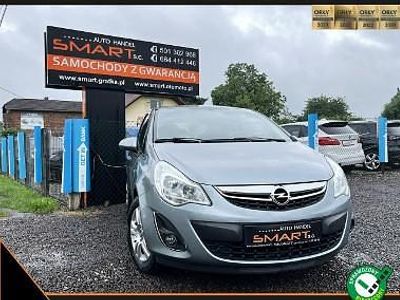 Używany Opel Corsa 70 KM (51 kW) 2012 Srebrny Hatchback