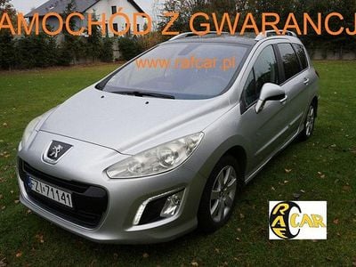 Używany Peugeot 308 SW 112 KM (82 kW) 2012 Srebrny (metalik) Kombi