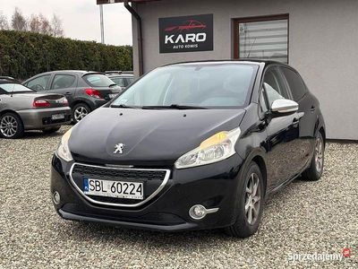 Czarny Używany 2014 Peugeot 208 Hatchback | 17 990 zł (Dość drogi)