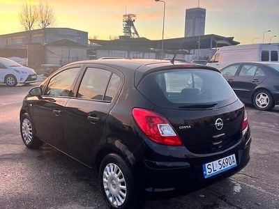 Używany Opel Corsa 65 KM (47 kW) 2013 Czarny Hatchback