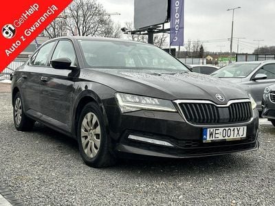 Używany Skoda Superb 150 KM (110 kW) 2019 Brązowobeżowy Hatchback