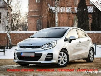 Używany Kia Rio 84 KM (61 kW) 2015 Srebrny (metalik) Sedan/Limuzyna