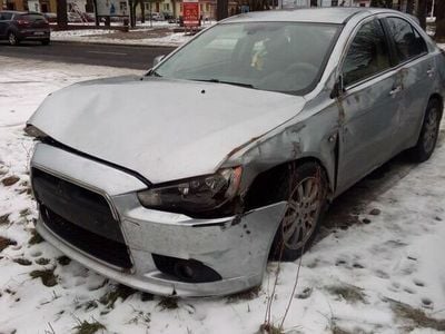 Srebrny Używany 2010 Mitsubishi Lancer Sedan/Limuzyna | 10 000 zł
