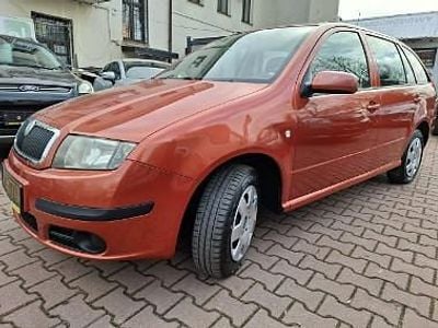 Używany Skoda Fabia 75 KM (55 kW) 2006 Czerwony Kombi