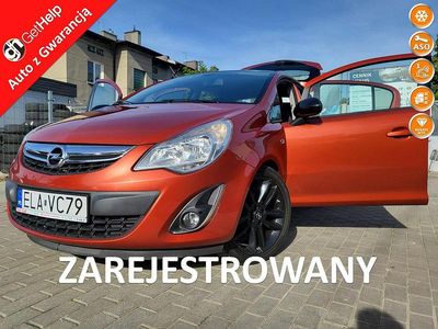 Używany Opel Corsa 85 KM (62 kW) 2012 Bordowy (metalik) Hatchback