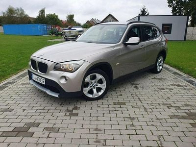 Używany BMW X1 177 KM (130 kW) 2011 Złoty SUV