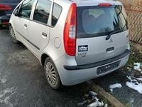 Używany Mitsubishi Colt 95 KM (69 kW) 2005 Srebrny Coupe