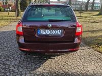 Używany Skoda Octavia Elegance 105 KM (77 kW) 2010 Bordowy Kombi