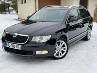 Używany Skoda Superb 170 KM (125 kW) 2011 Czarny (metalik) Kombi