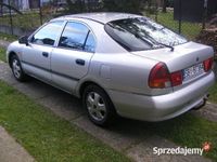 Używany Mitsubishi Carisma 1999 Srebrny Hatchback