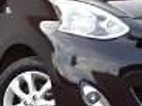 Używany Nissan Micra 98 KM (72 kW) 2014 Brązowy (metalik) Hatchback